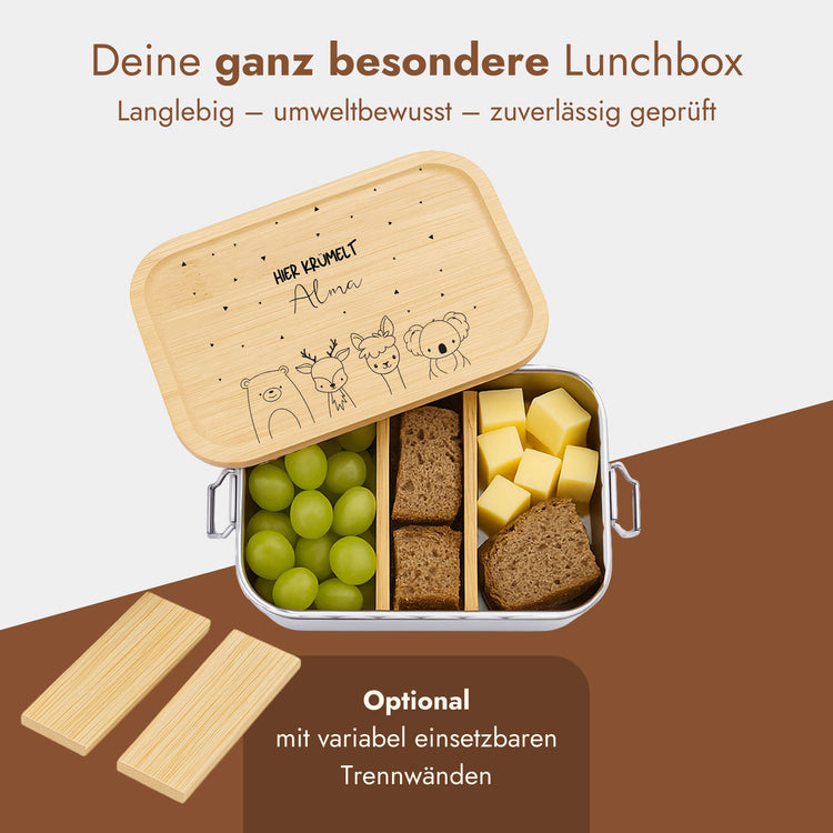 Personalisierte Edelstahl-Brotdose mit Bambusdeckel, graviertem Namen Alma und niedlichen Waldtieren, gefuellt mit Snacks.