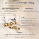 Personalisiertes Fahrrad-Multitool aus Buchenholz mit Namensgravur und neun Edelstahl-Werkzeugen im kompakten Klappformat.