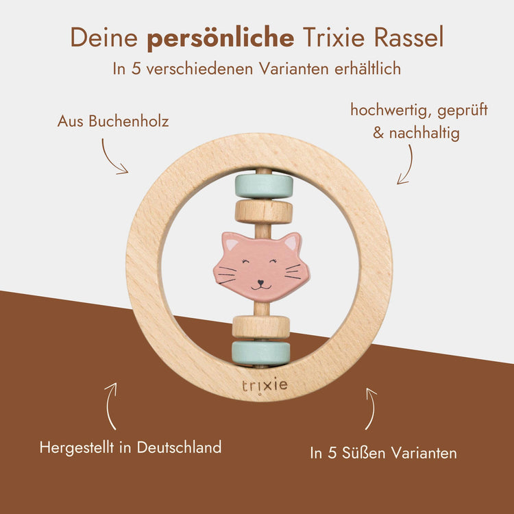 Personalisierbarer Greifling aus Buchenholz mit Katzenmotiv und pastellfarbenen Ringen von Trixie.